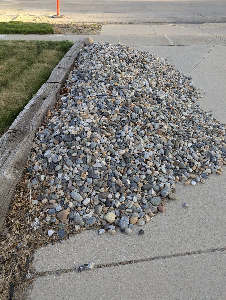 Rock, decorative granite mix with river. About 2.5 yards