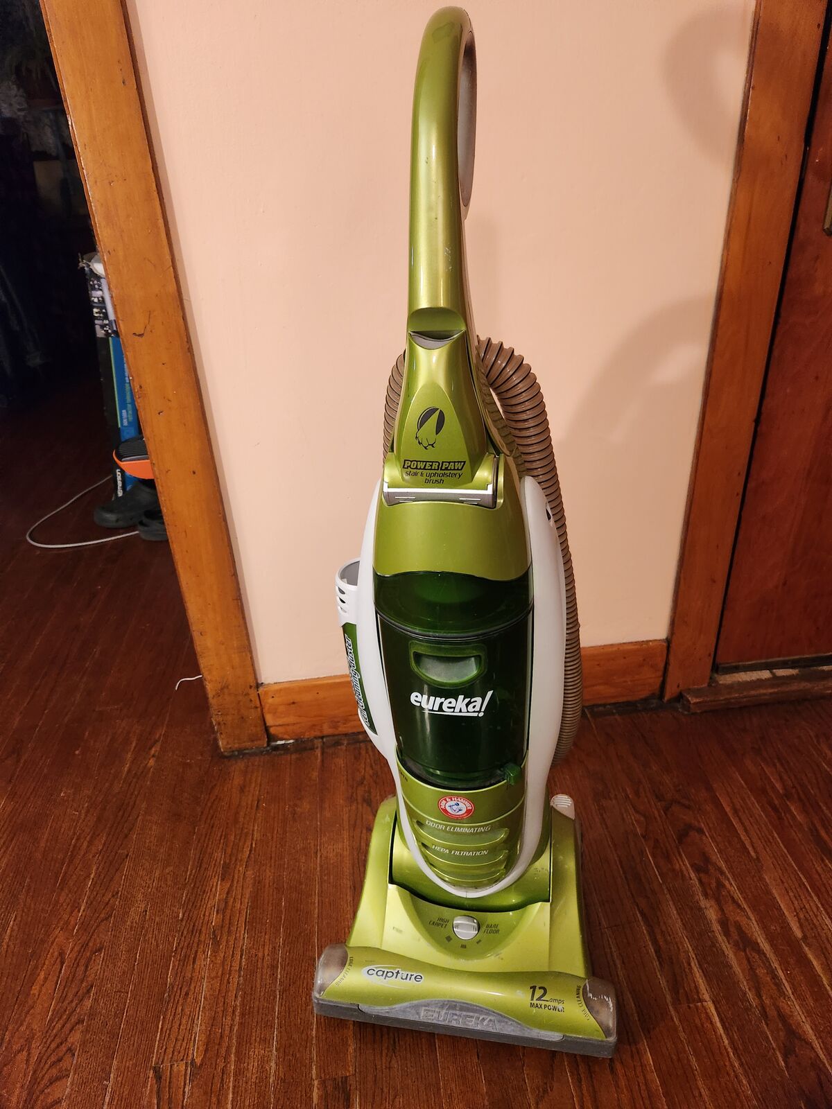 Eureka Capture bagless vacuum. 12 Amps POWERFUL. Has rotating beater brush tool and edge tool.
