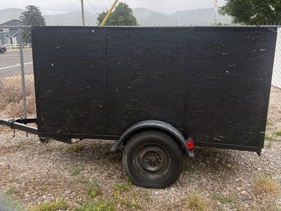 Single-axle enclosed-side utility trailer