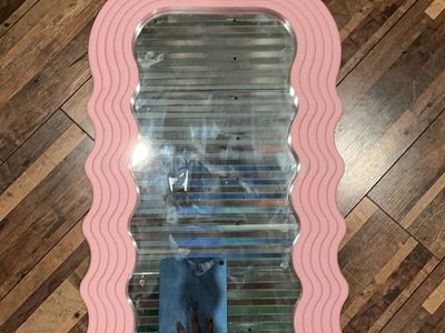 Pink wavy mirror