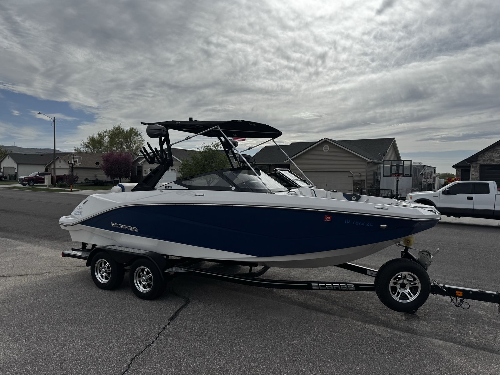 Scarab 215 HO Jet Boat with Wakeboard Tower, Bimini Top & Trailer