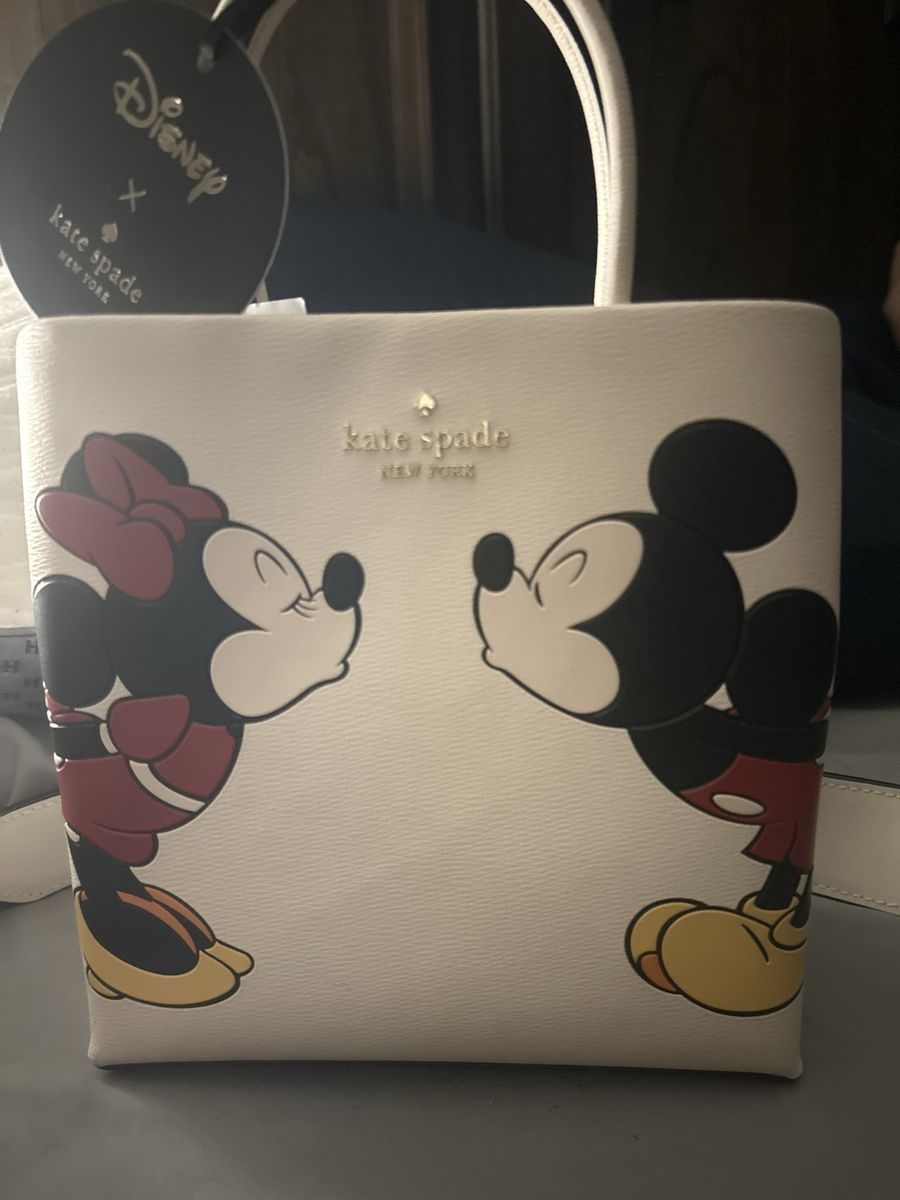 Kate Spade rare and unique mini and Mickey white purse. Never used.