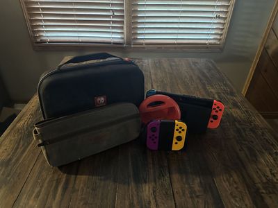 Nintendo Switch 1st Ed Bundle — Dock, Joy-Cons, WaterField Cases, + More