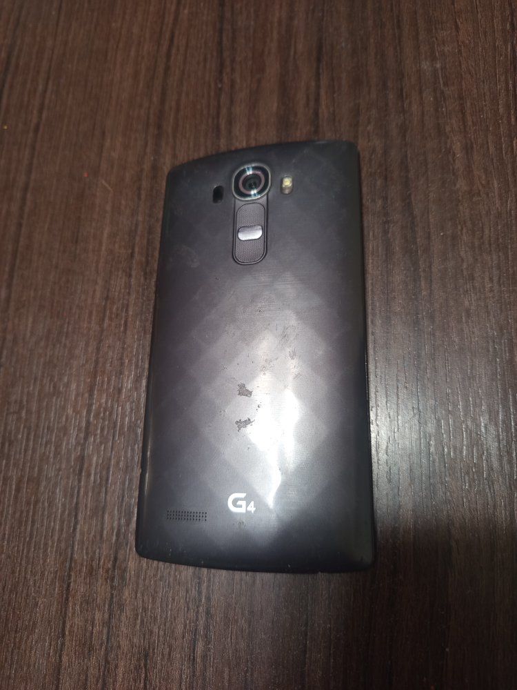 LG G4 T-Mobile phone for parts or use As is
