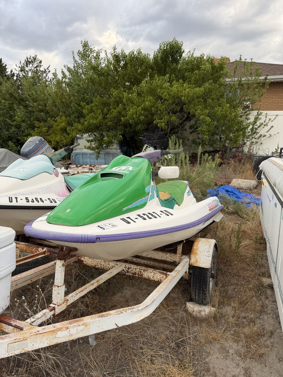 Two 1994 Seadoo Jet Skiis and 2 place trailer