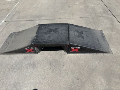 Skate or bike ramp
