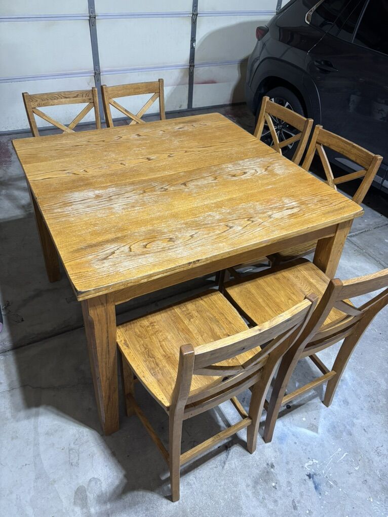 Tall Kitchen Table with 8 Chairs/built In Leaf.