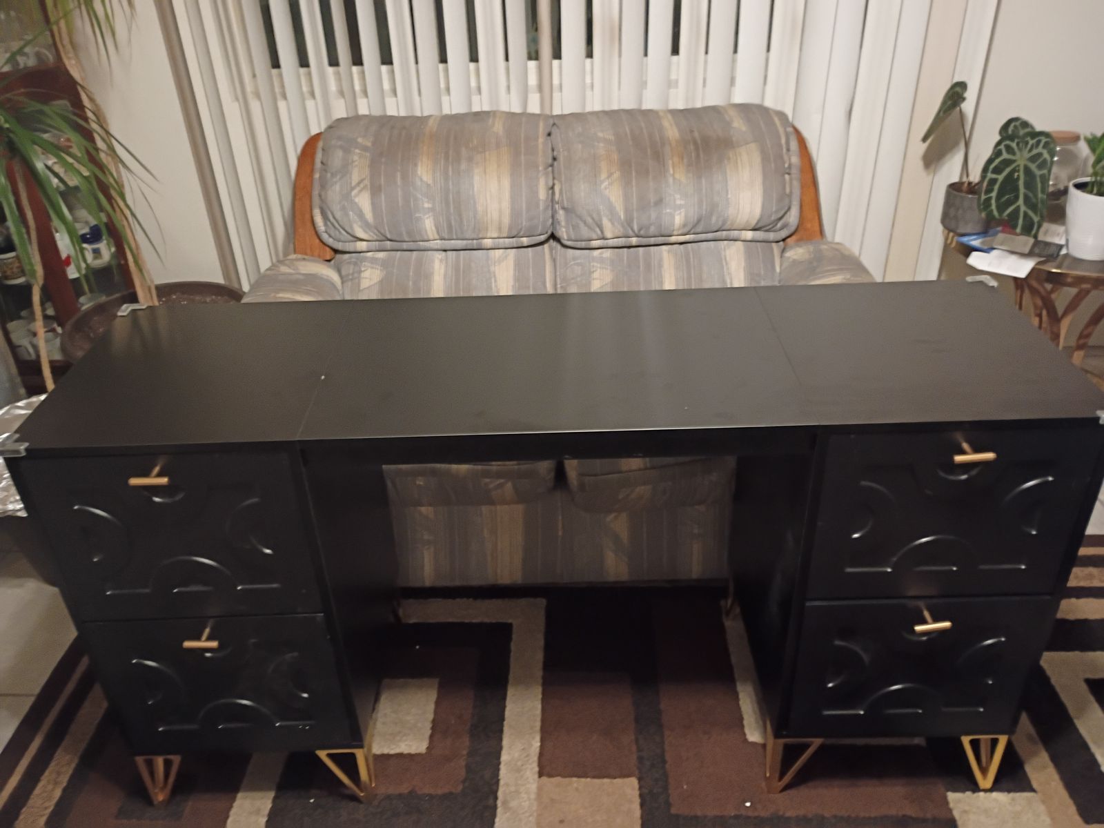 Modern Black Desk with Gold Accent Hardware and Four Drawers