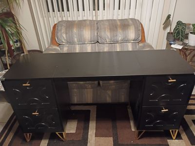 Modern Black Desk with Gold Accent Hardware and Four Drawers