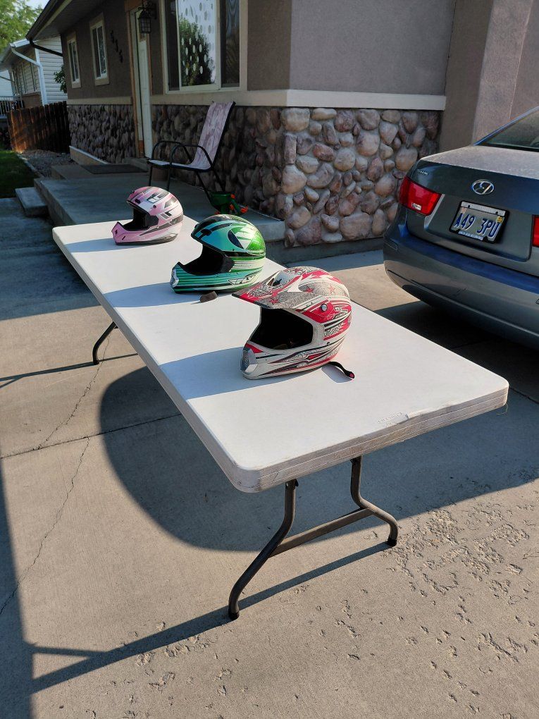 table and ATV helmets for sale