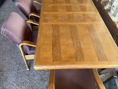 Vintage table and rolling Chairs