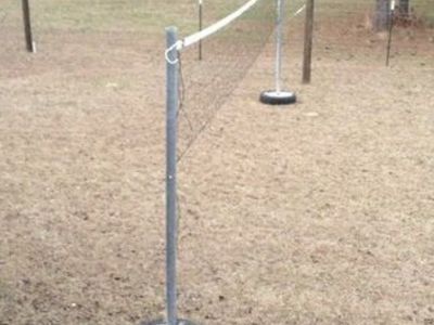 In search of volleyball poles in cement tires