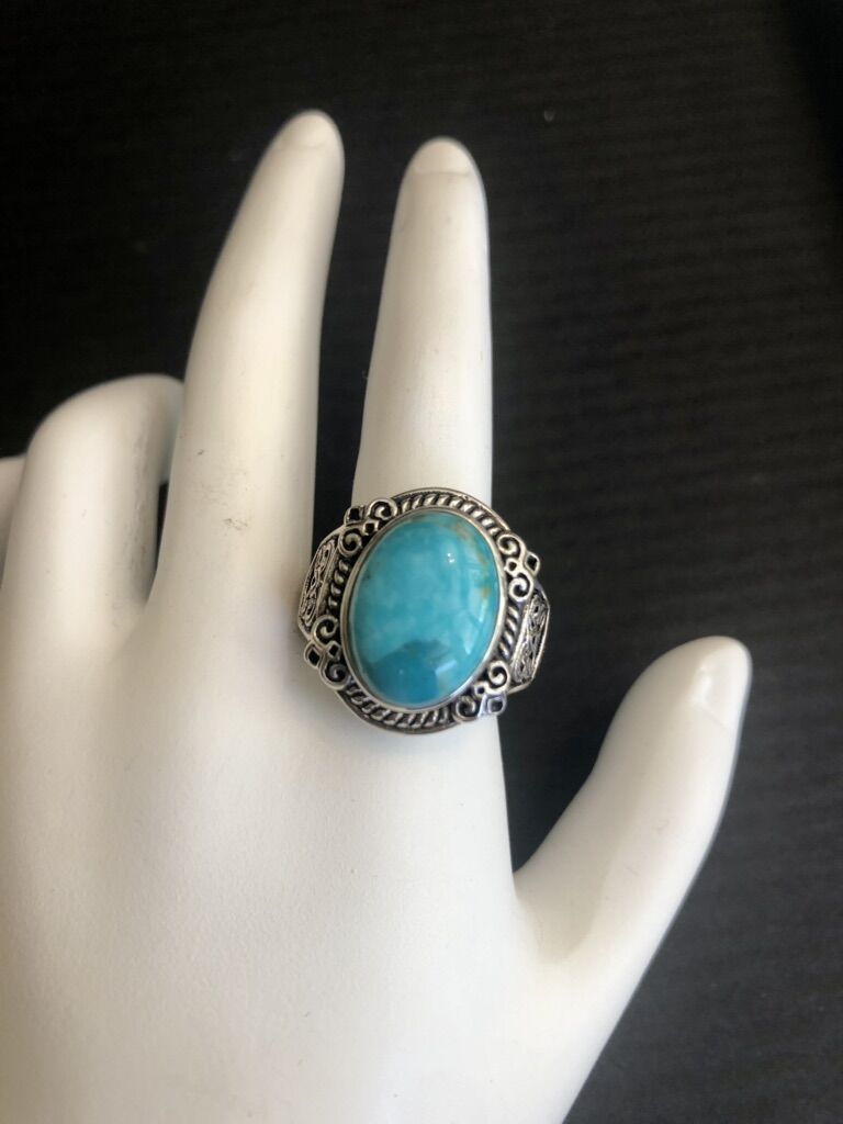 Decorated Sterling Silver Ring With Oval Turquoise