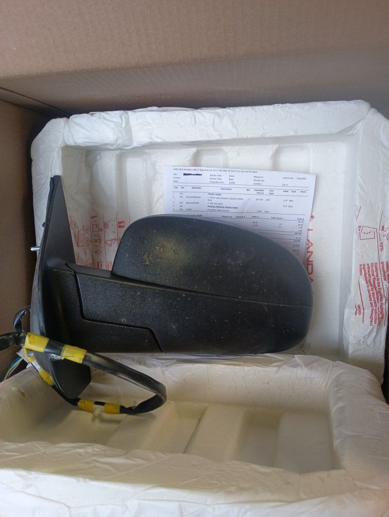 2009 Chevy Silverado 1500 mirror with signal and power folding.