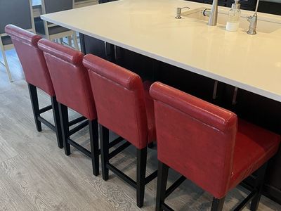 Set of 4 Red Faux Leather Barstools with Dark Wood Legs