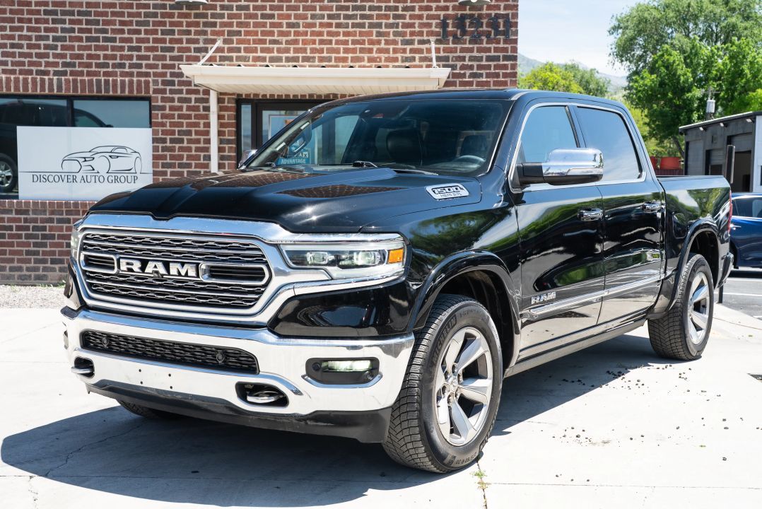 2020 RAM 1500 Limited — rebuilt & branded title, 17% below market