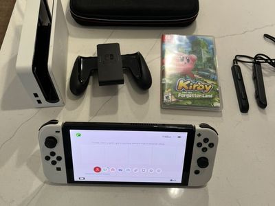 Nintendo switch OLED Bundle. With Game