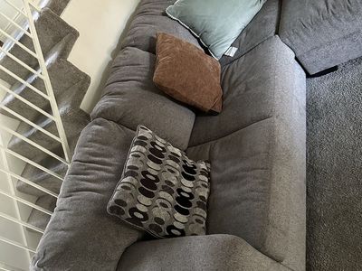 Spacious Gray Sectional Sofa with Chaise and Throw Pillows - Modern & Comfortable