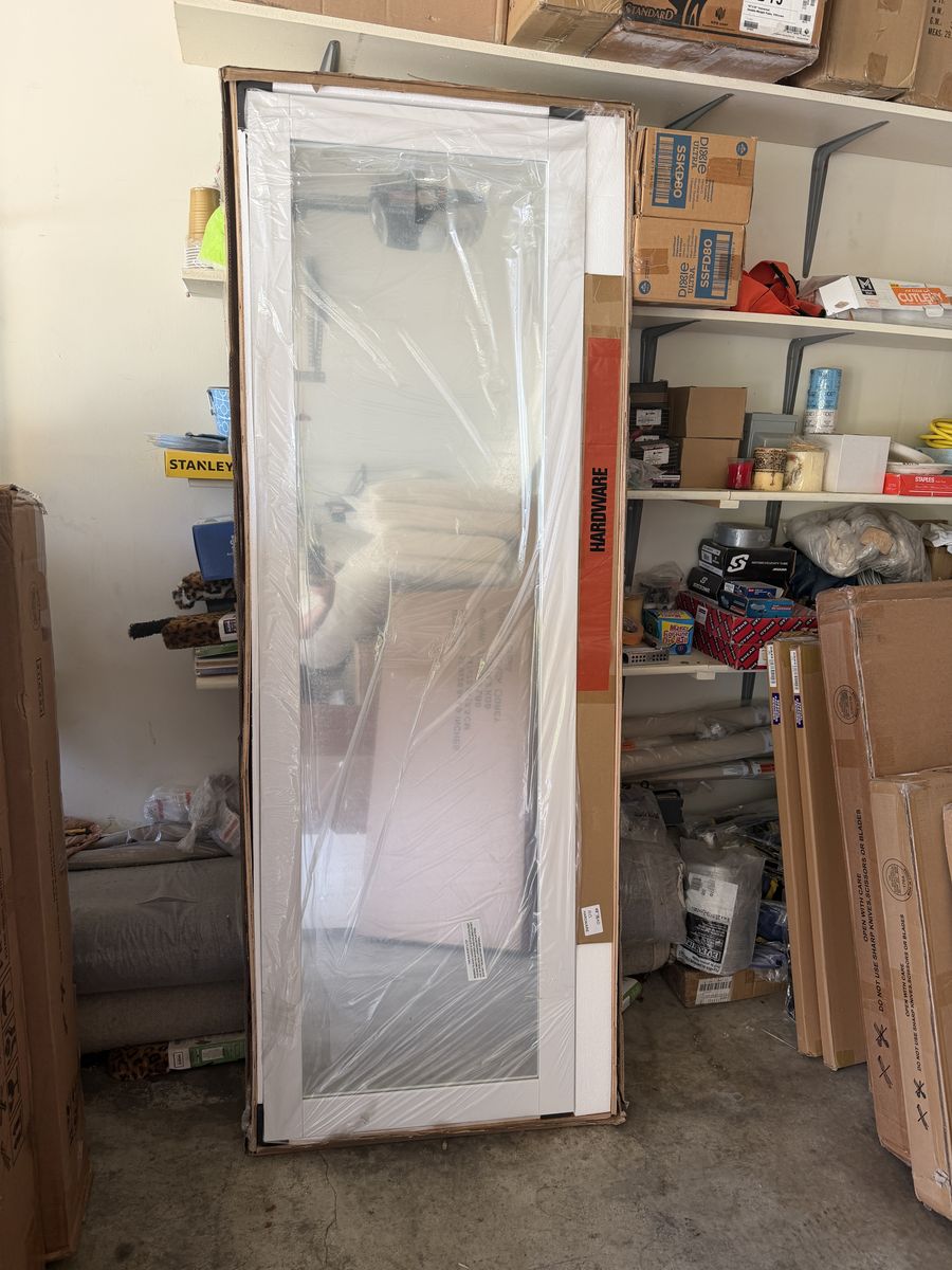 Brand new sliding doors with mirror (25x79) each, total of 2