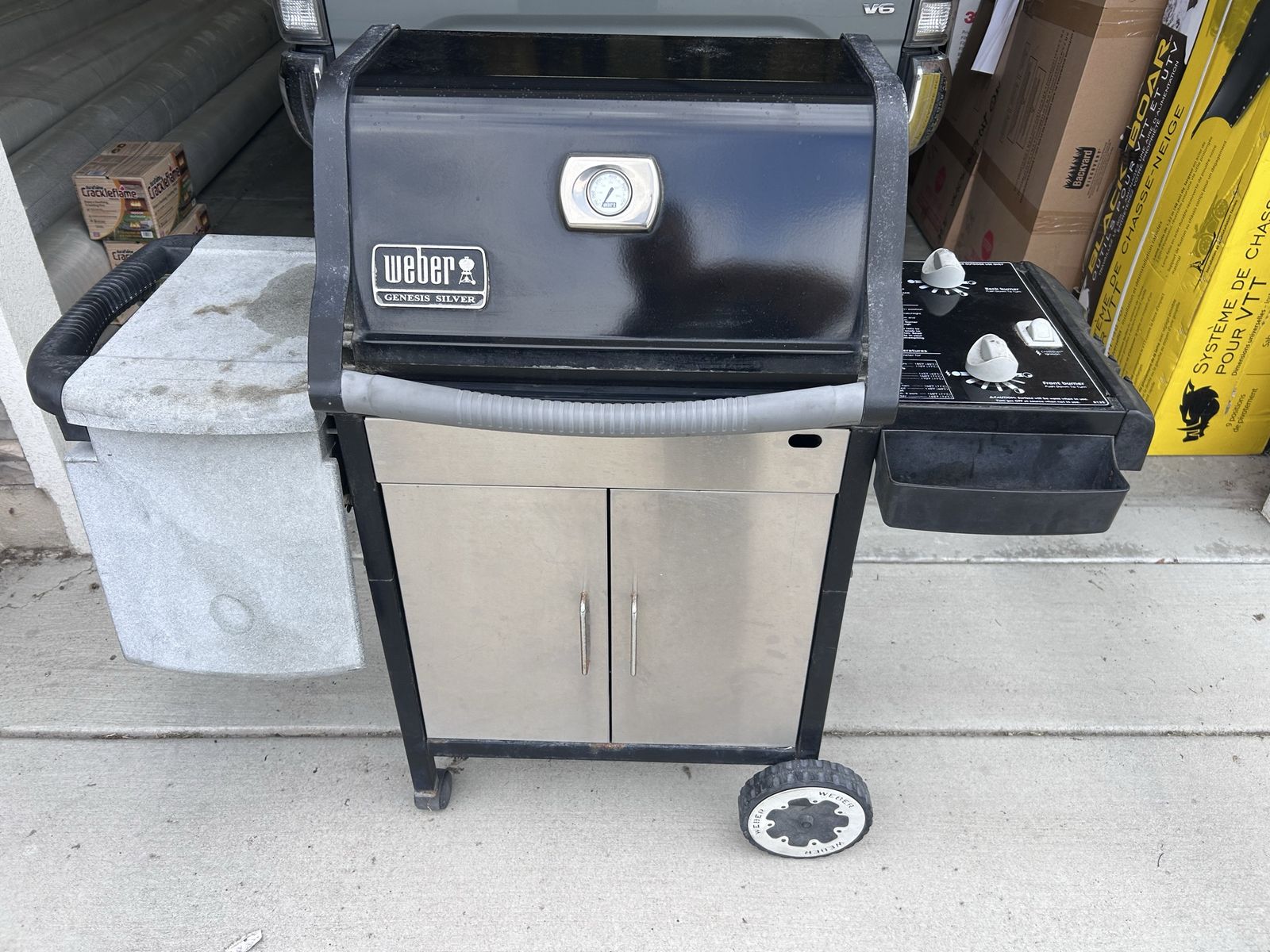 Weber Genesis Silver Liquid Propane Gas Grill with Side Shelf and Storage Cabinet