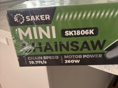 Mini chainsaw new never opened