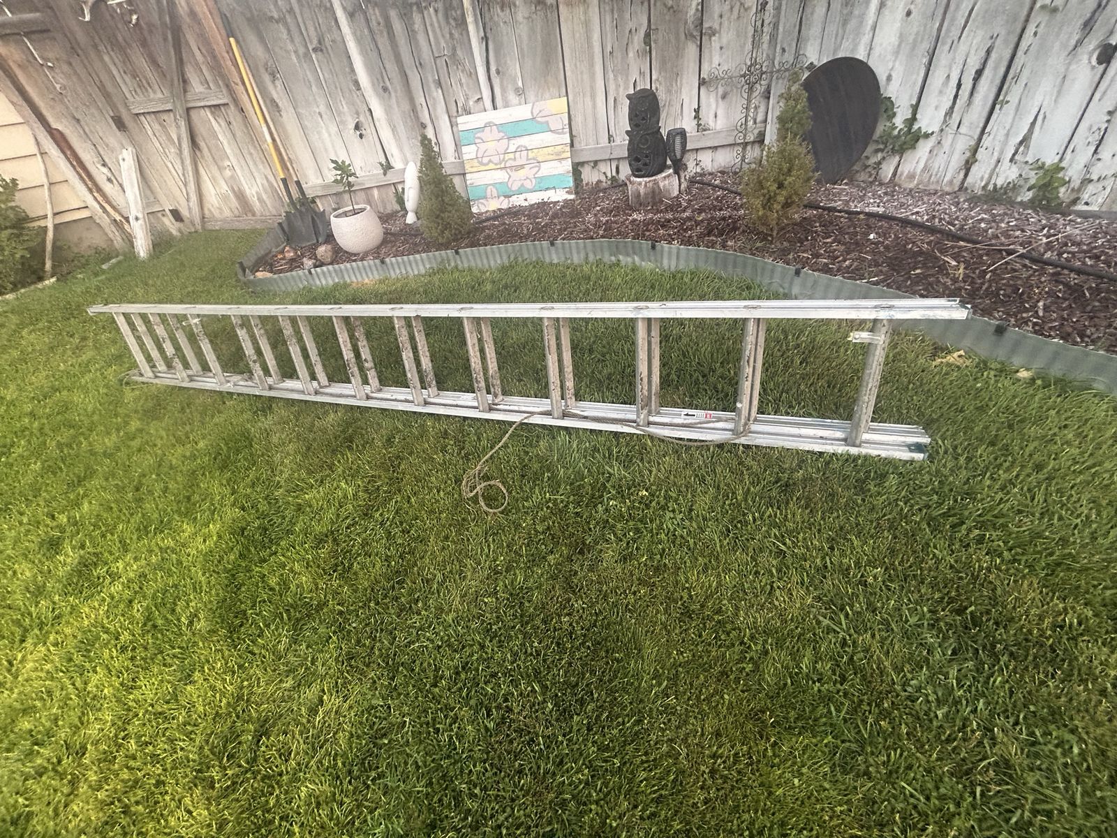 24 foot aluminum industrial extension ladder has a 300 lb load capacity