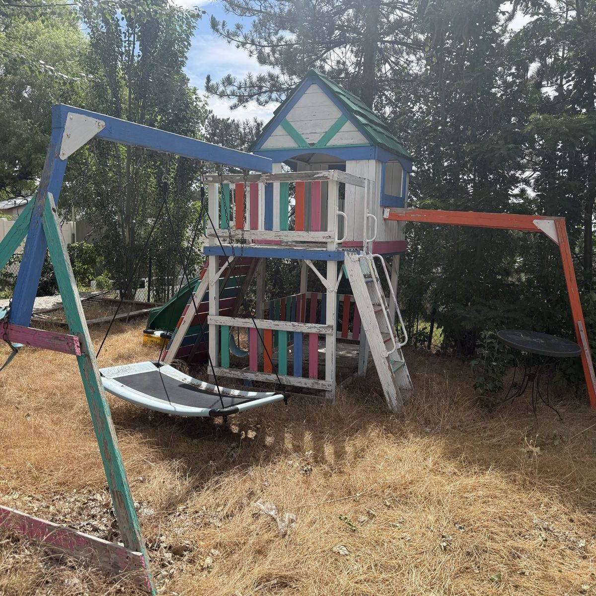 Kid's Outdoor Playhouse with Slide - Sturdy Wooden Construction, Weathered Paint