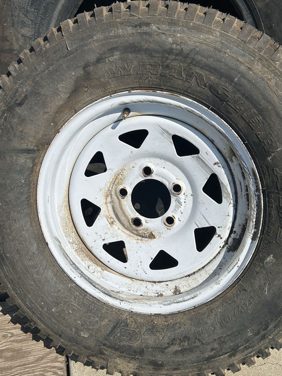 Goodyear Wrangler AT/S LT215/75R15 Tire on 5-Lug White Steel Wheel
