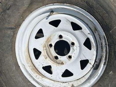 Goodyear Wrangler AT/S LT215/75R15 Tire on 5-Lug White Steel Wheel