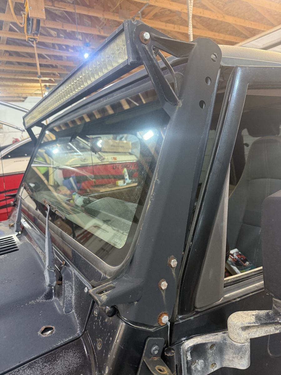 Jeep TJ light bar and mounting bracket.