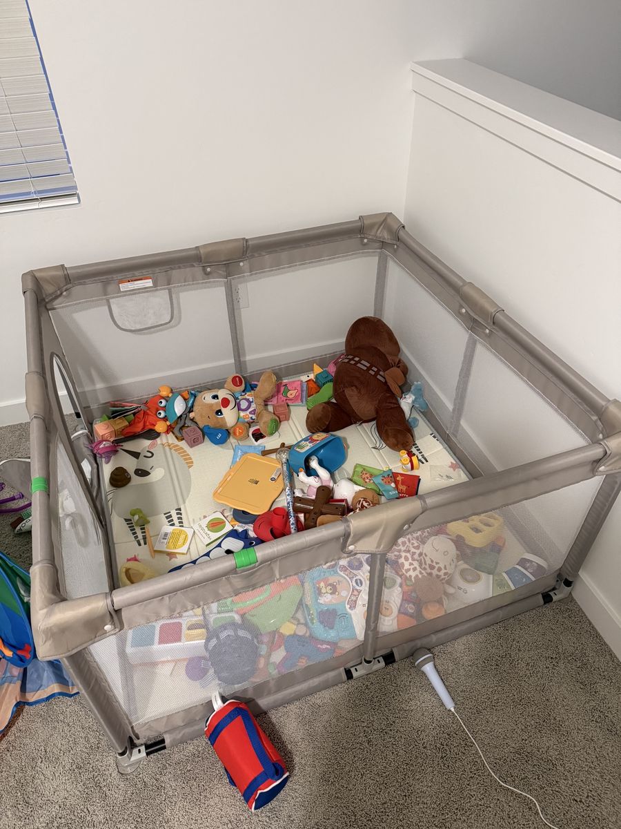 Toddler playpen with mat