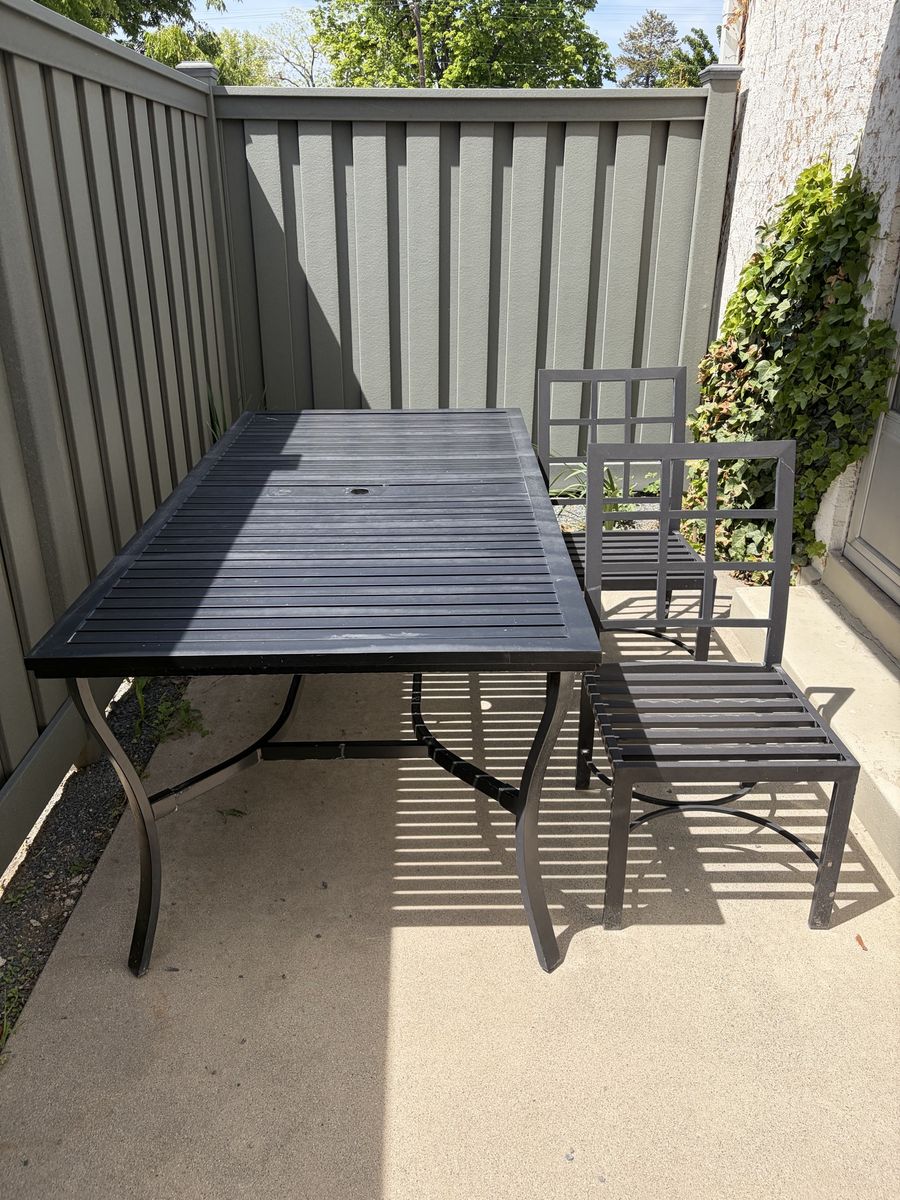 Aluminum outdoor dining table seats six with six c