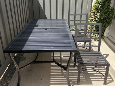 Aluminum outdoor dining table seats six with six c