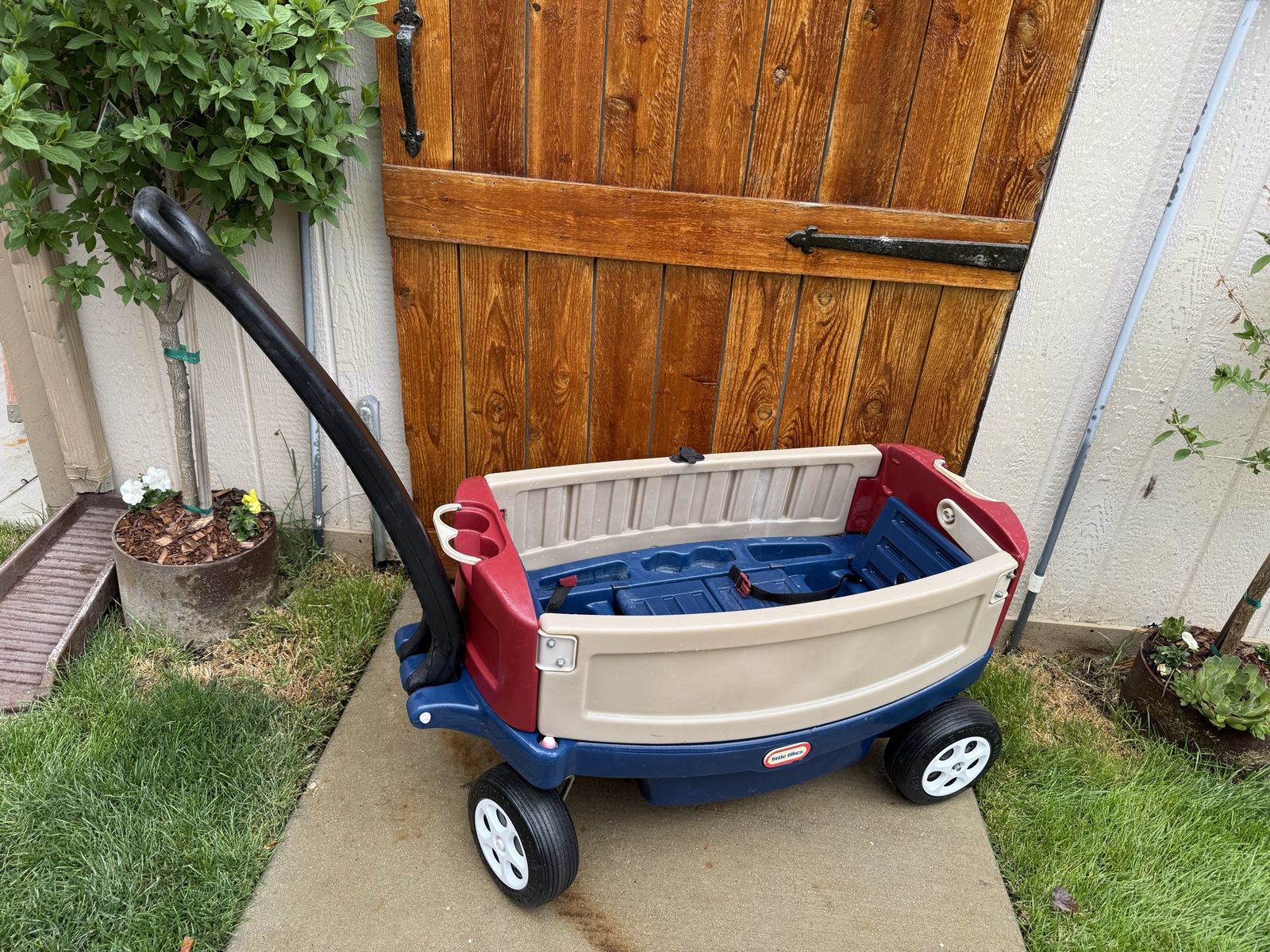 Deluxe 2 seat kids wagon with storage, seatbelts and cup holders