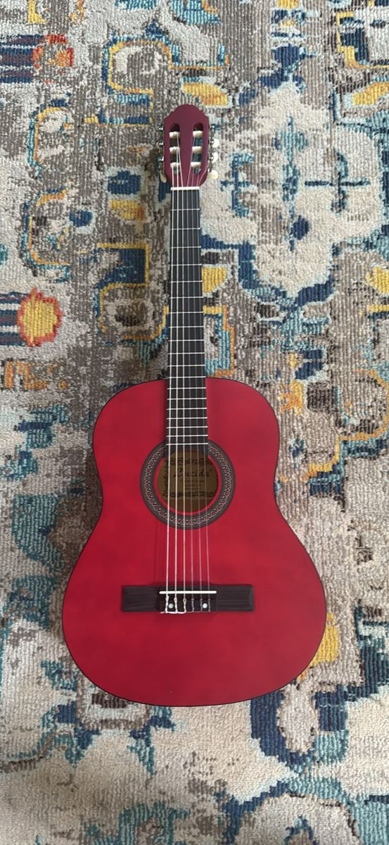 Red 6 string guitar