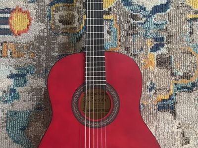 Red 6 string guitar