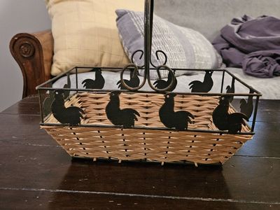 Black metal rooster and woven basket