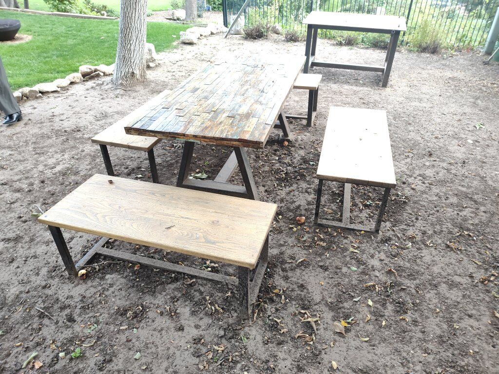 Outdoor steel table with rustic wood top