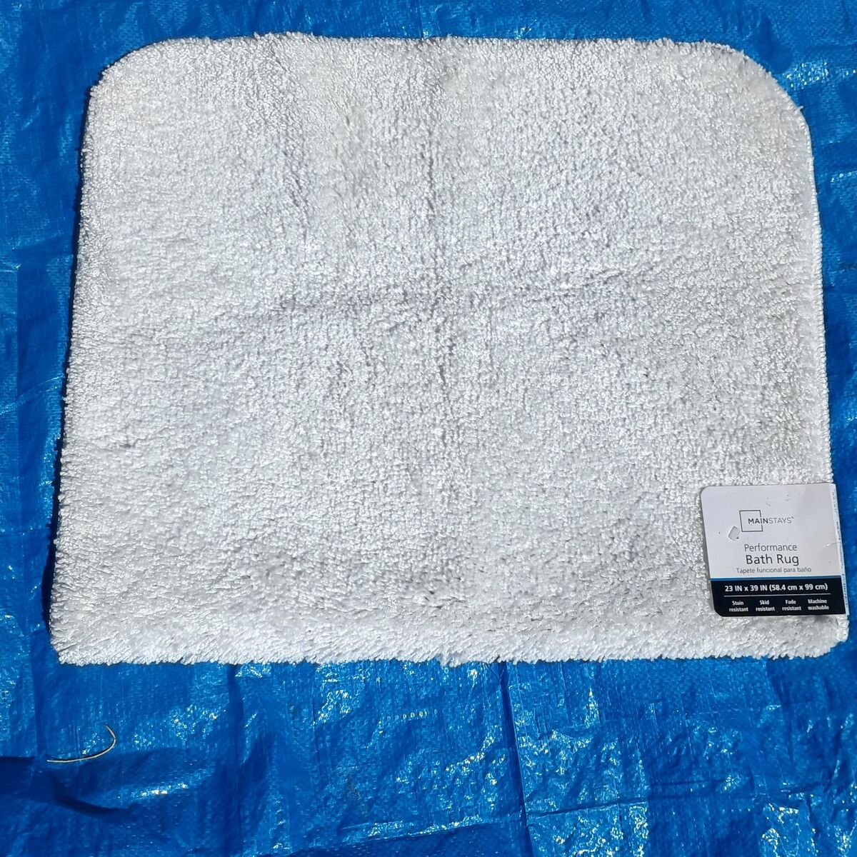 brand new white bath mat/rug