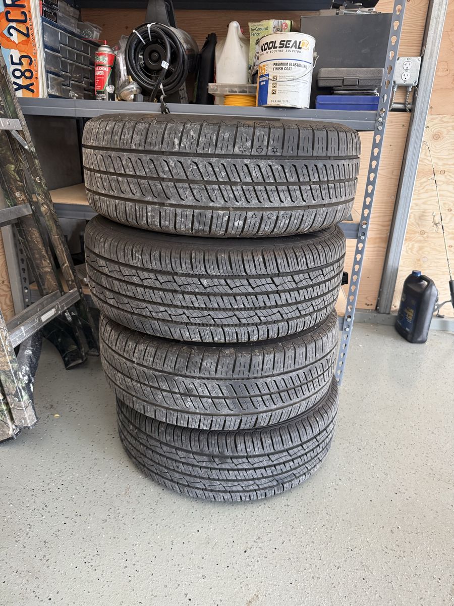Set of 4 Continental ControlContact Tour A/S Tires 215/60R16 95H with Steel Wheels
