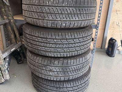Set of 4 Continental ControlContact Tour A/S Tires 215/60R16 95H with Steel Wheels