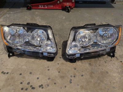 Jeep Grand Cherokee Headlight Assembly -both sides