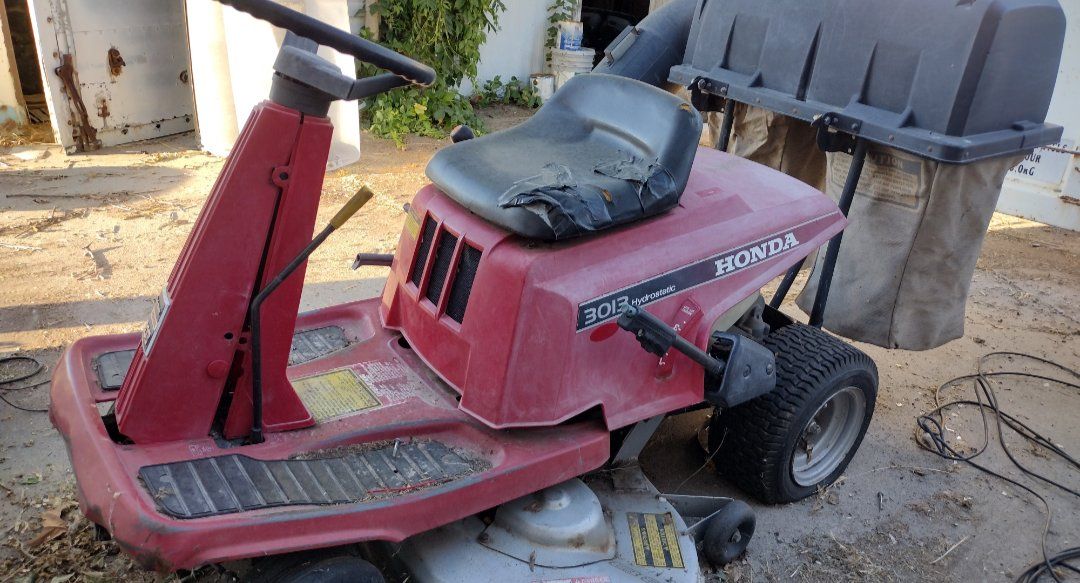 Honda riding mower 3013 hydrostatic turn but doesn't start with Grass catcher 
Parking break stuck in one tire