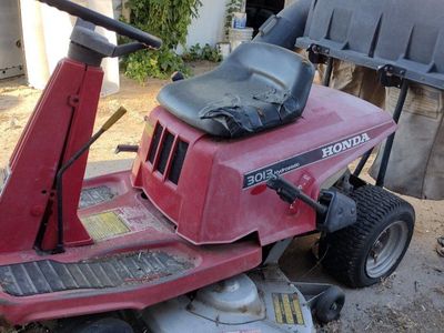Honda riding mower 3013 hydrostatic turn but doesn't start with Grass catcher
Parking break stuck in one tire