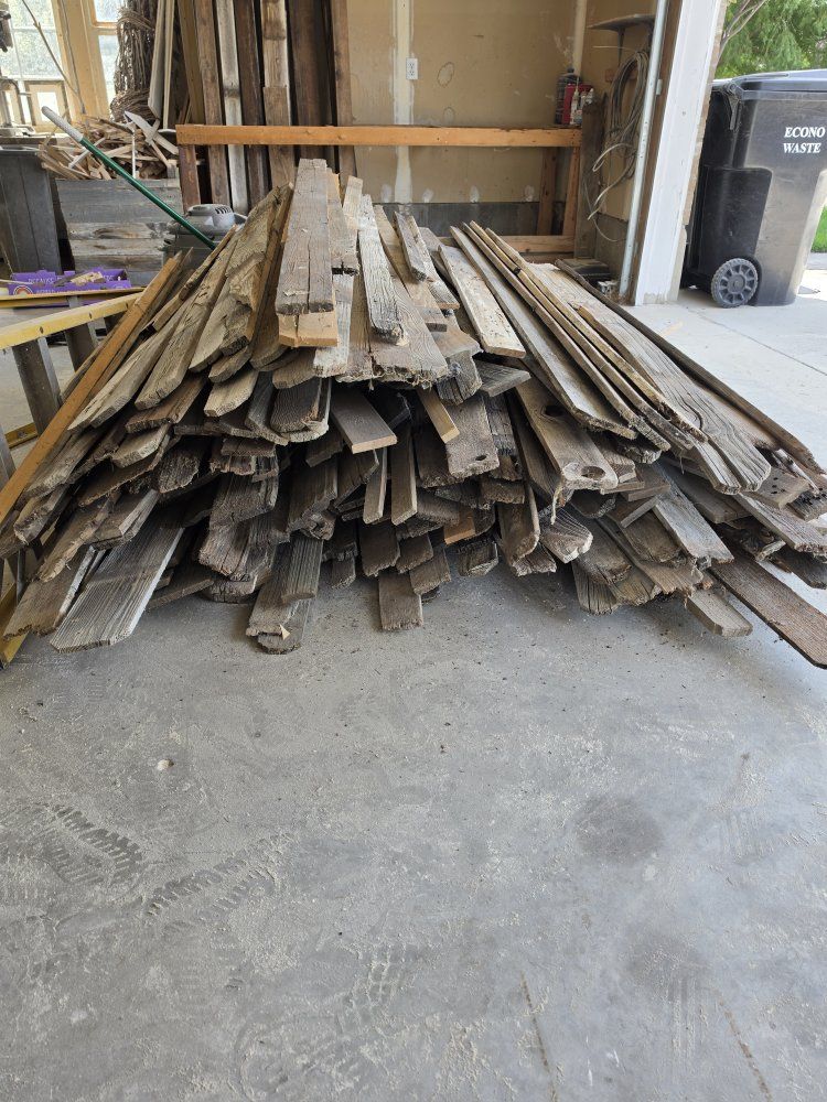 large pile of barnwood and fence slats