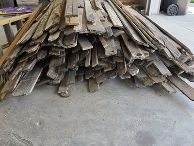 large pile of barnwood and fence slats