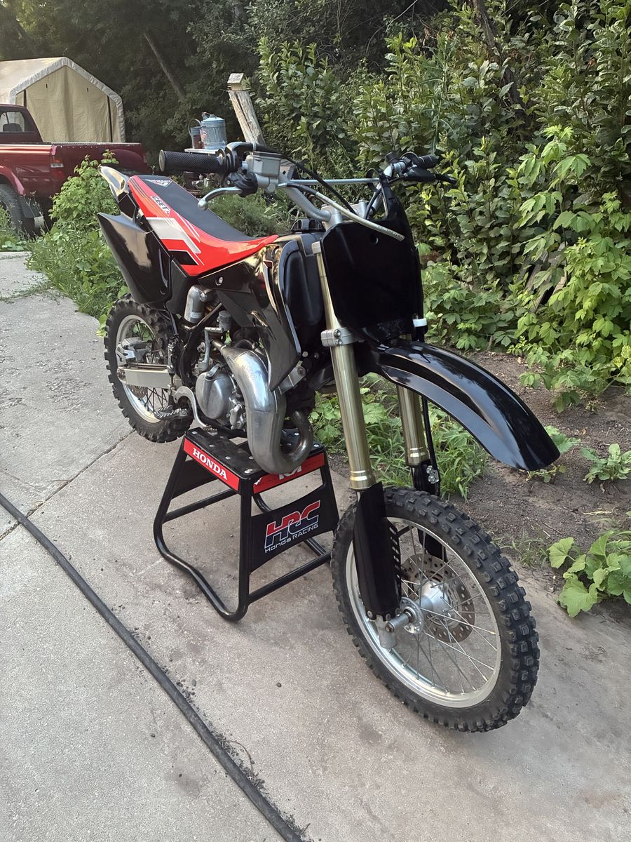 Honda CR85R Dirt Bike - Black & Red, Well-Maintained Off-Road Motorcycle