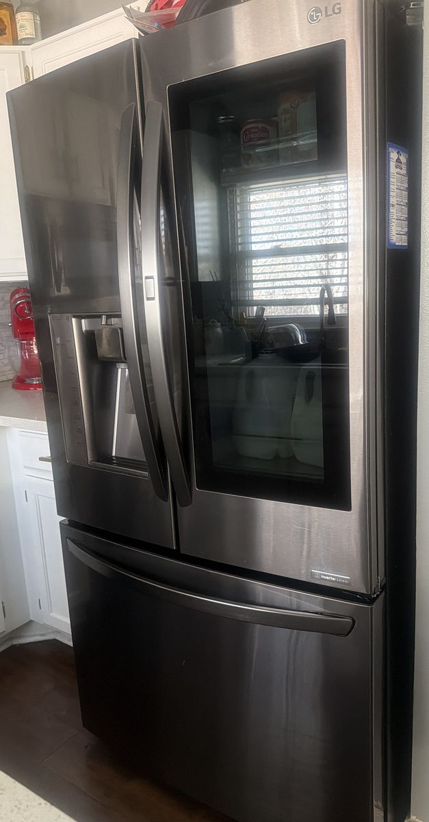 LG InstaView Regrigeraror (grass Door) stainless S