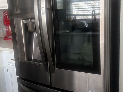 LG InstaView Regrigeraror (grass Door) stainless S