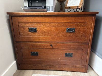 Beautiful wood lateral file cabinet.